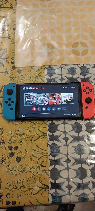 nintendo switch oled only used for one year. Good price 2