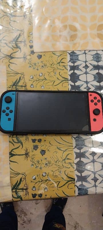 nintendo switch oled only used for one year. Good price 4