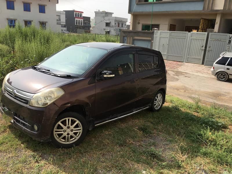 Daihatsu Mira 2010 4