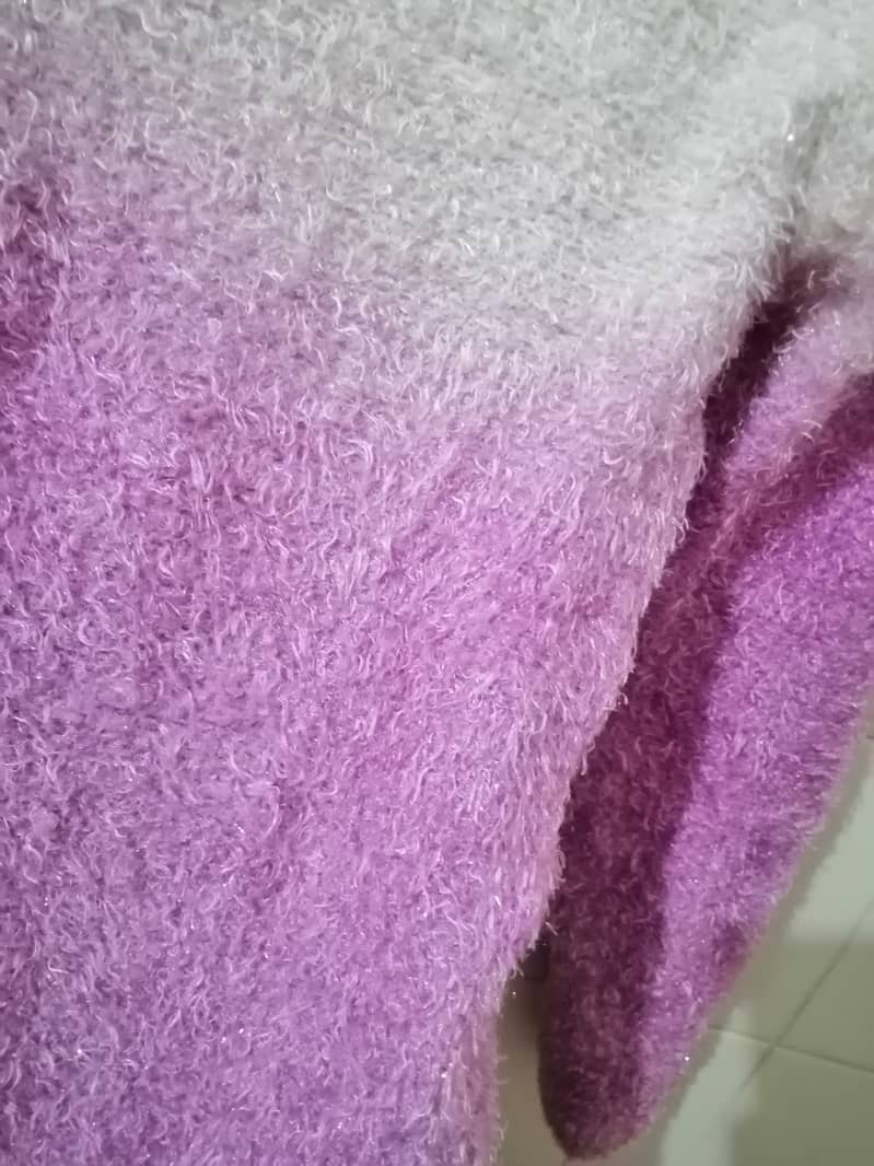 Purple fur shirt.  Its branded fur style shirt. . Lighter weight. 2