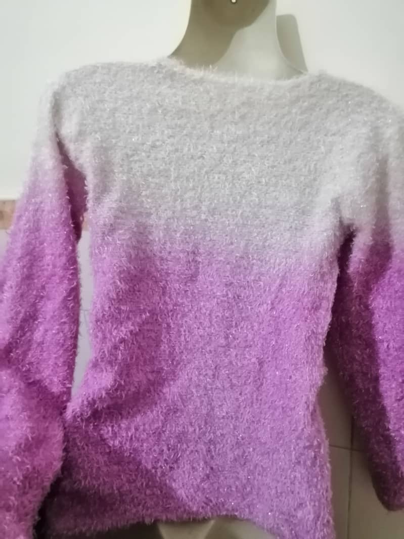 Purple fur shirt.  Its branded fur style shirt. . Lighter weight. 4