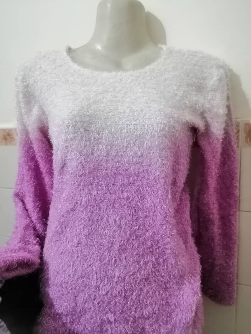 Purple fur shirt.  Its branded fur style shirt. . Lighter weight. 5