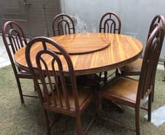 Wooden Round Dinning table with 6Leather seats