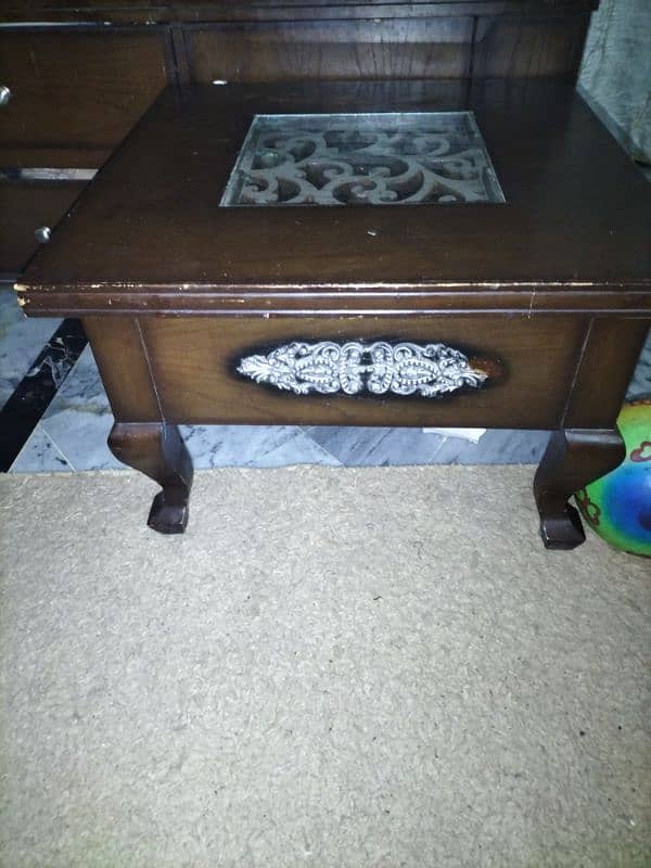 I am selling Double bed with side table. Dressing table. table set 2