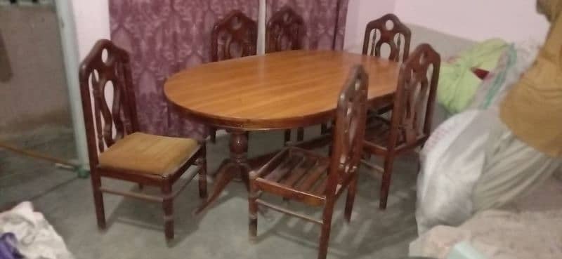 Dining table & 6 Chairs,,,,wood. 1