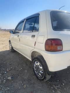 Daihatsu Cuore 2004 CNG PLUS PETROL