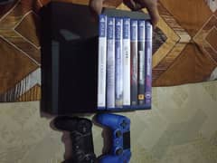 PS4 FAT 500GB SEALED WITH 7 GAMES 2 CONTROLLERS GOOD CONDITION