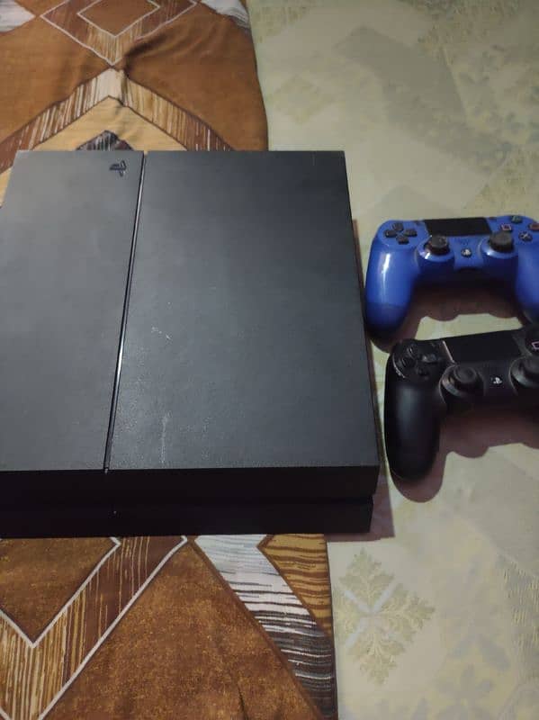 PS4 FAT 500GB SEALED WITH 7 GAMES 2 CONTROLLERS GOOD CONDITION 1