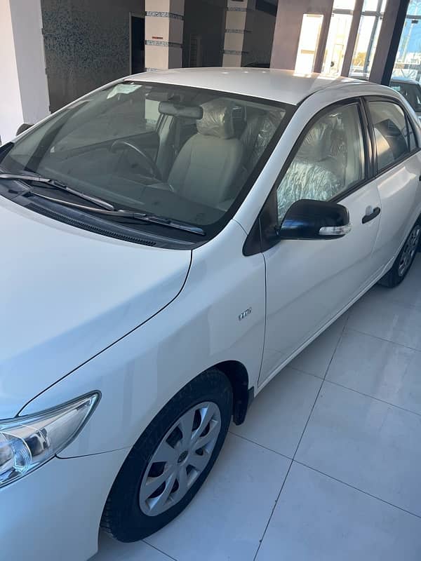 Toyota Corolla XLI 2012 like brand new car. low millage 1