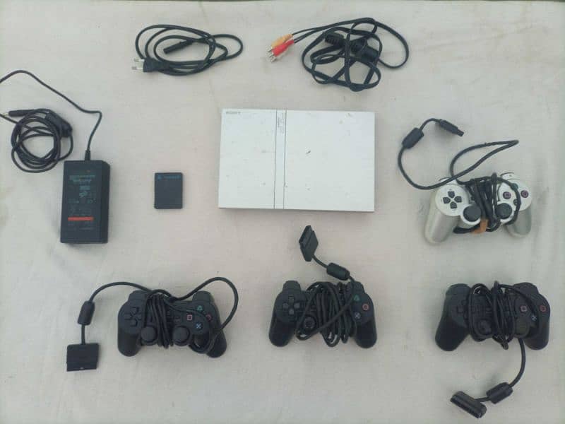 Playstation 2 with Four controllers urgent sell 0