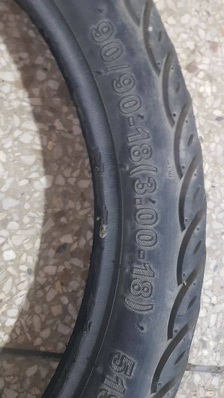 Service Tyre Honda 125 back side 1