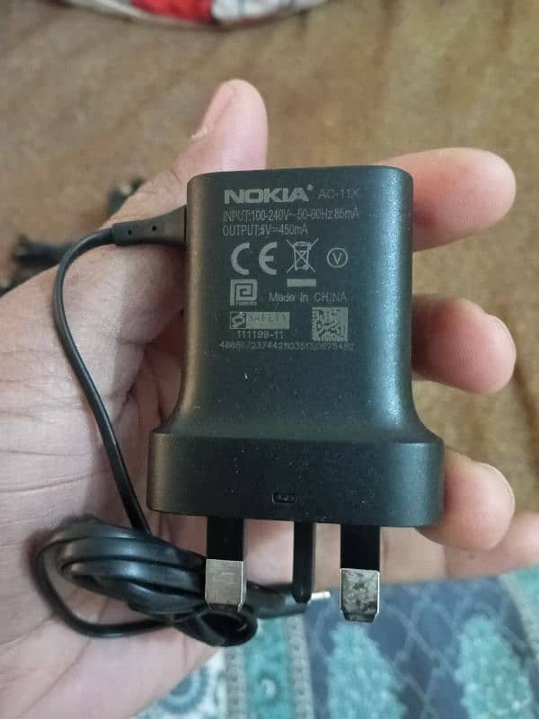 Nokia ka dabay say neklay hoay original barek pin walay charger 0