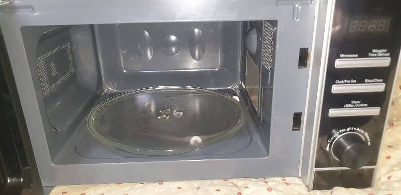 brand new 1 year guarantee neat and clean microwave for sell urgent 3