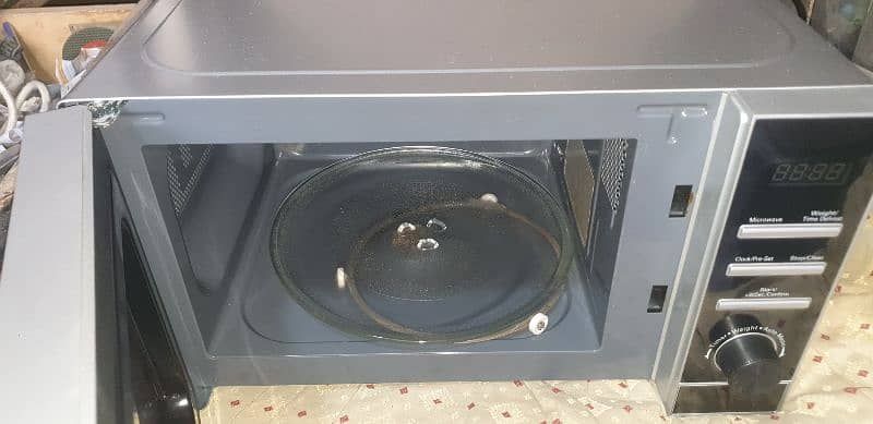 brand new 1 year guarantee neat and clean microwave for sell urgent 4