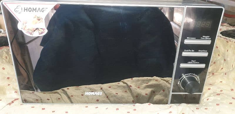 brand new 1 year guarantee neat and clean microwave for sell urgent 5