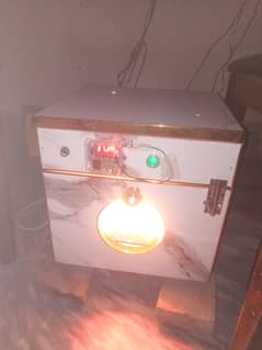 Egg incubator machine