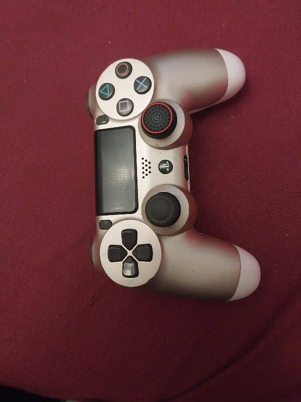 used ps4 controller with grip but the condition is like a new one 0