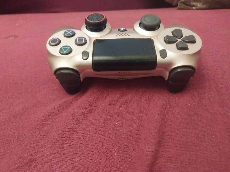 used ps4 controller with grip but the condition is like a new one 1