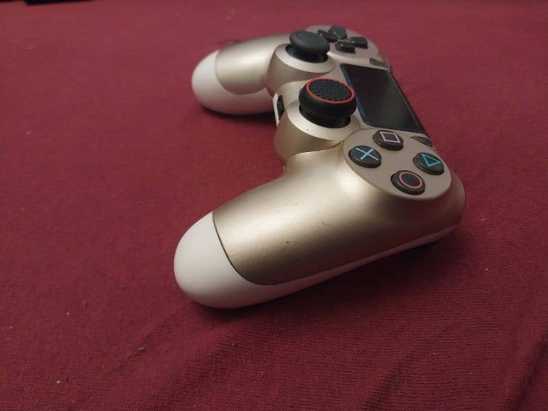 used ps4 controller with grip but the condition is like a new one 2