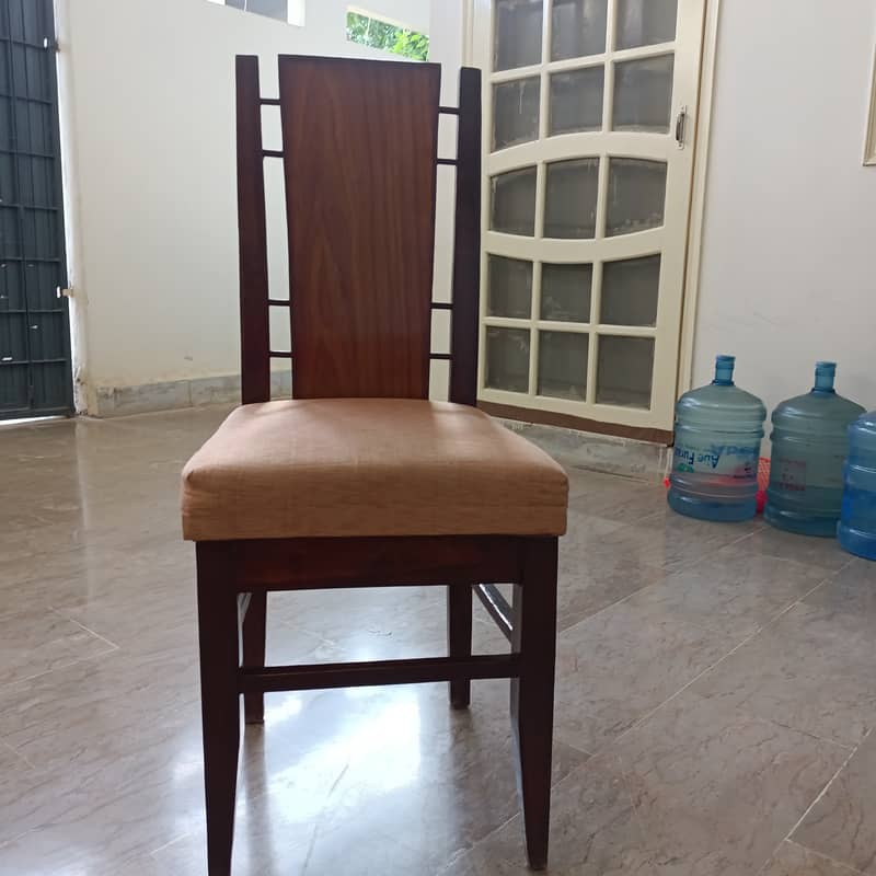 Round Dinning Table with 4 chairs. Glass placed over wooden top 5