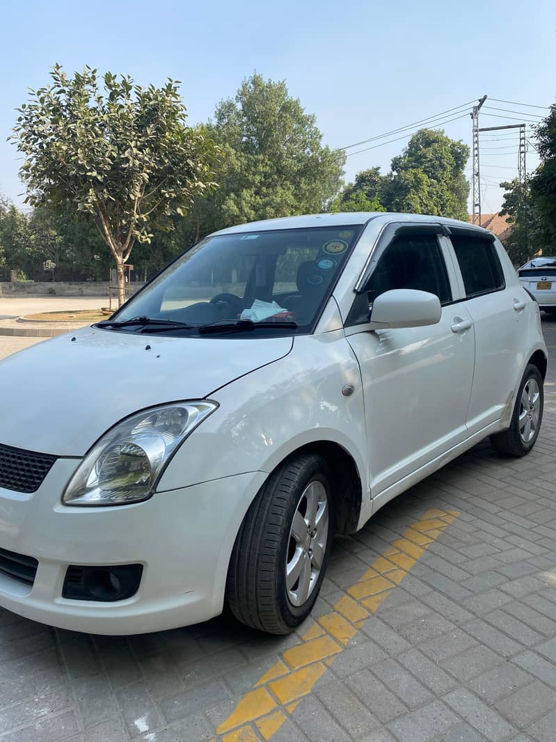 Suzuki Swift 2011 Total Genuine 5