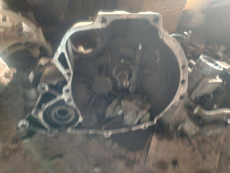 Nissan throatle body with ignit, tapet cover and gearbox etc 4