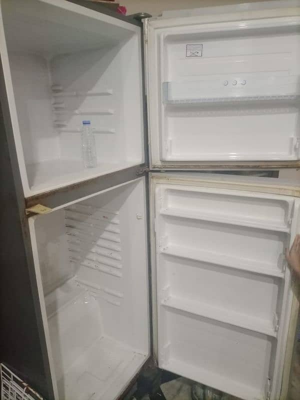 selling my fridge due  urgent need of money 5