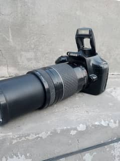 canon 1100D With auto 75/300 lense all assesries price final