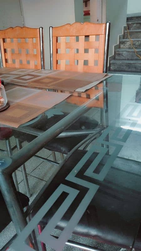 Glass Top Dinning Table with 6 Chairs 1