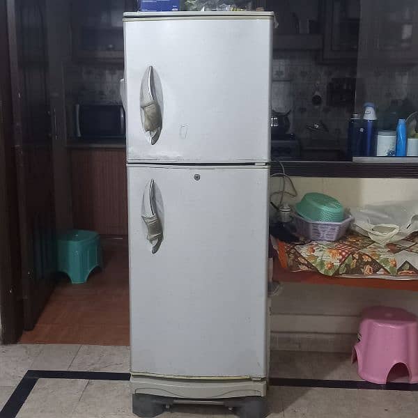 used medium sized refrigerator 0