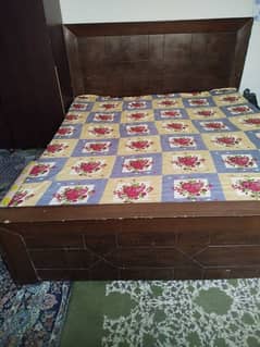 wooden double bed