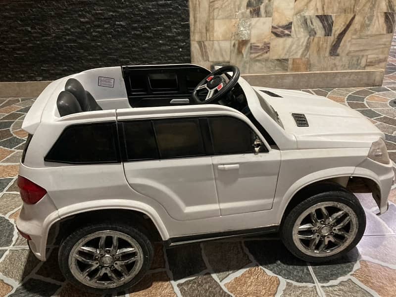 kids big size two seater fortuner style car 4