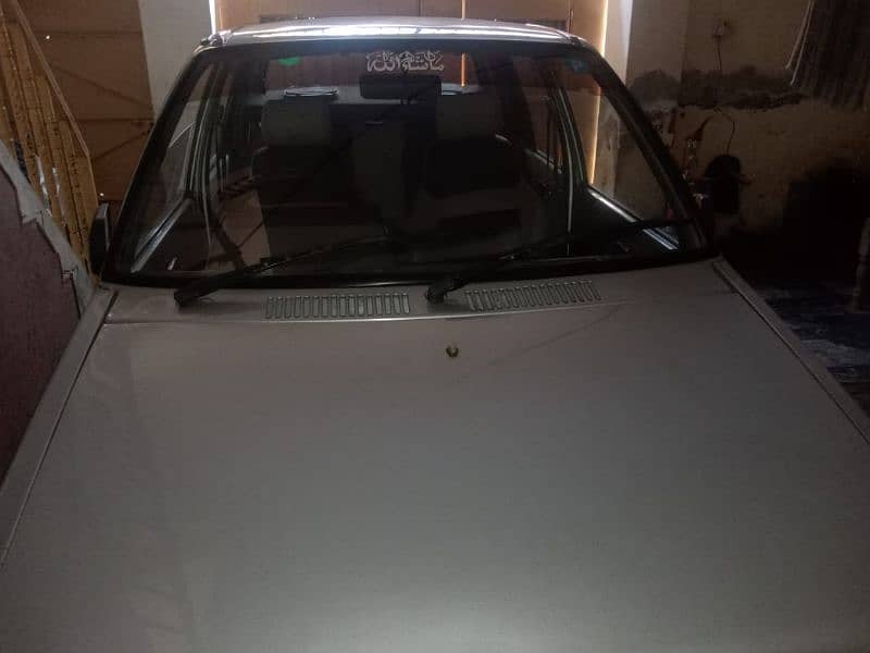 Suzuki Mehran VX 2012 silver total genuine 12