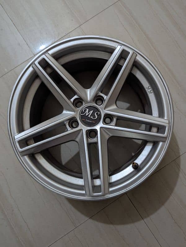 Alloy Rims. 15 inch. 5 Nuts. 0