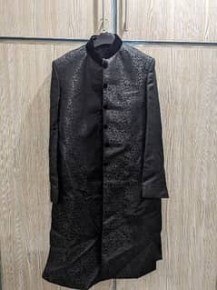 Black decent sherwani.