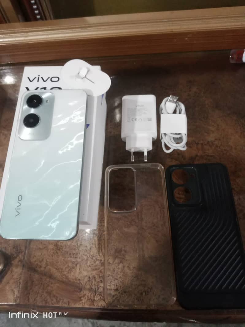 Vivo Y 18 4+4 128 mint and new condition and 6 month warranty 7