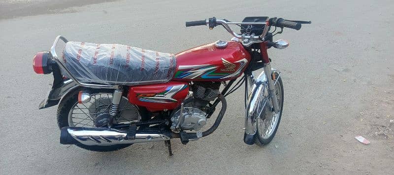 Honda CG-125 red 2023 March Karachi number 3