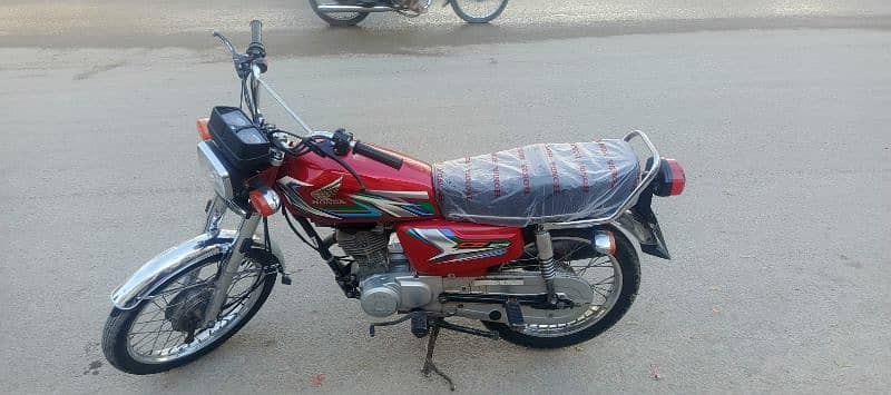 Honda CG-125 red 2023 March Karachi number 4