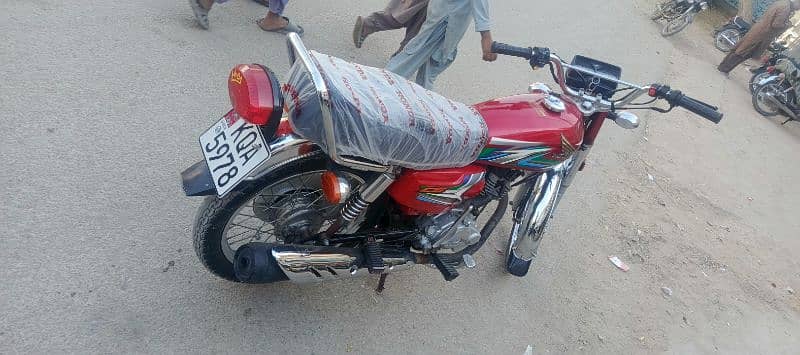 Honda CG-125 red 2023 March Karachi number 6