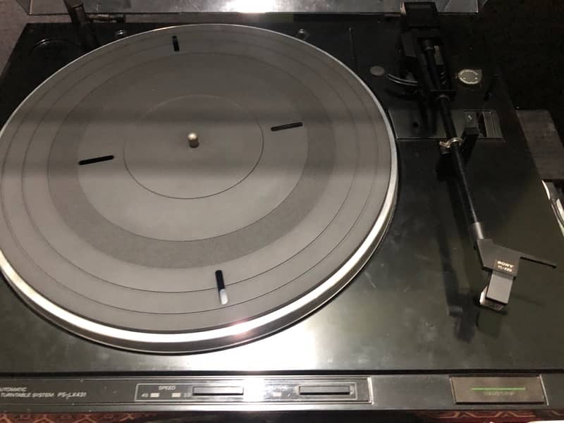 sony turntable with records in mint condition 0