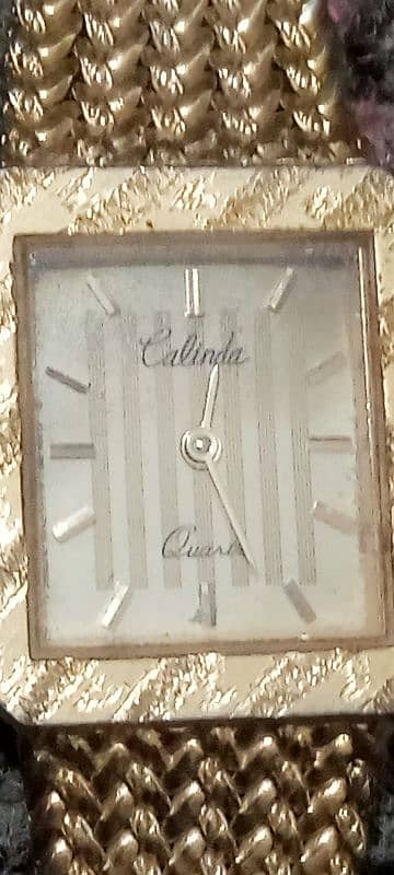 Calinda golden ladies watch . 1