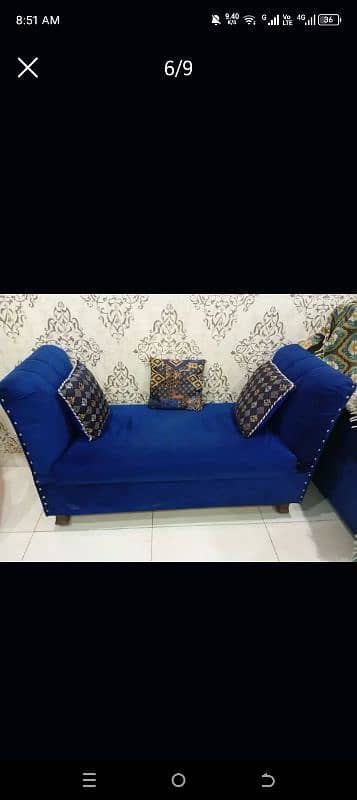 Sofa set with certains and table and other items only 40k 3