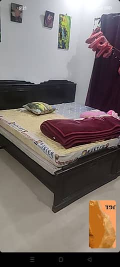 pair of single beds with mattress