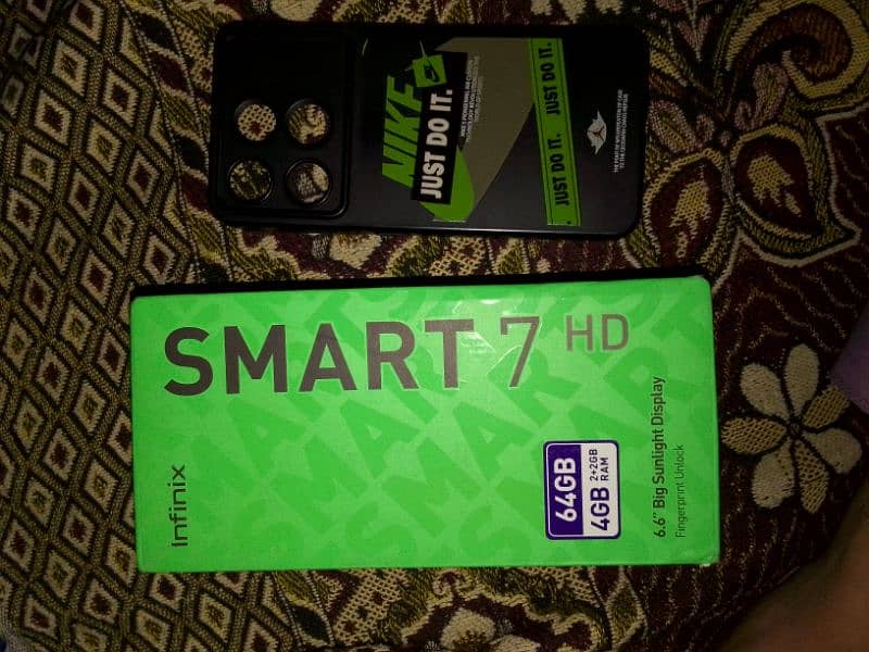 Infinix smart 7 HD 2+2 and 64 0