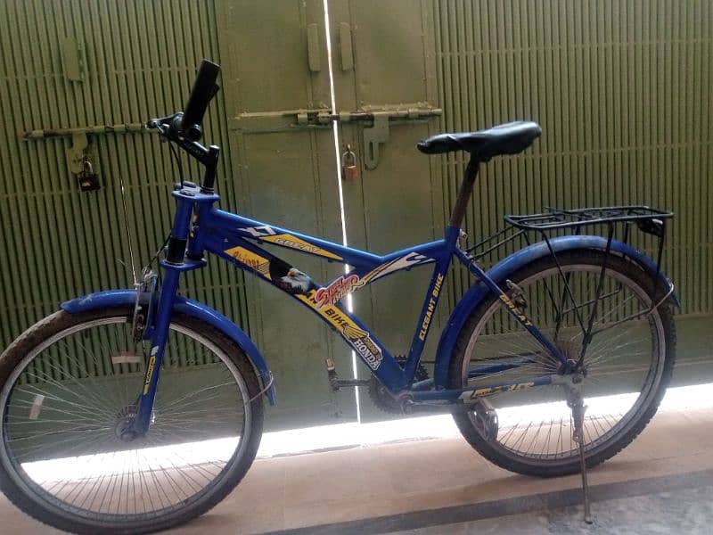 this bicycle was boys blue colour one break two seats to 0