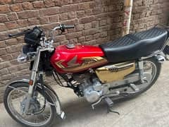 Honda 125 self start special gold addition