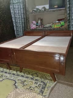 2 Sheesham wood single beds in attractive condition