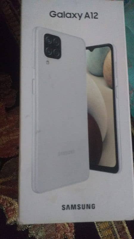 Samsung galaxy a12 with box 4/64 7