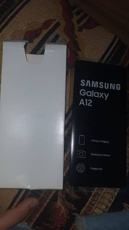 Samsung galaxy a12 with box 4/64 8