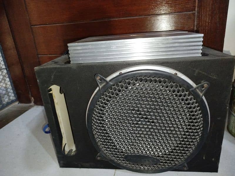 SLIGHTLY USED AMP and WOOFER 2